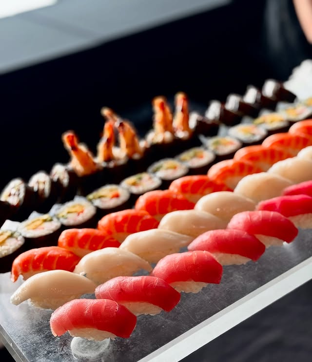Premium nigiri sushi line including salmon tuna and shrimp for NYC platter catering