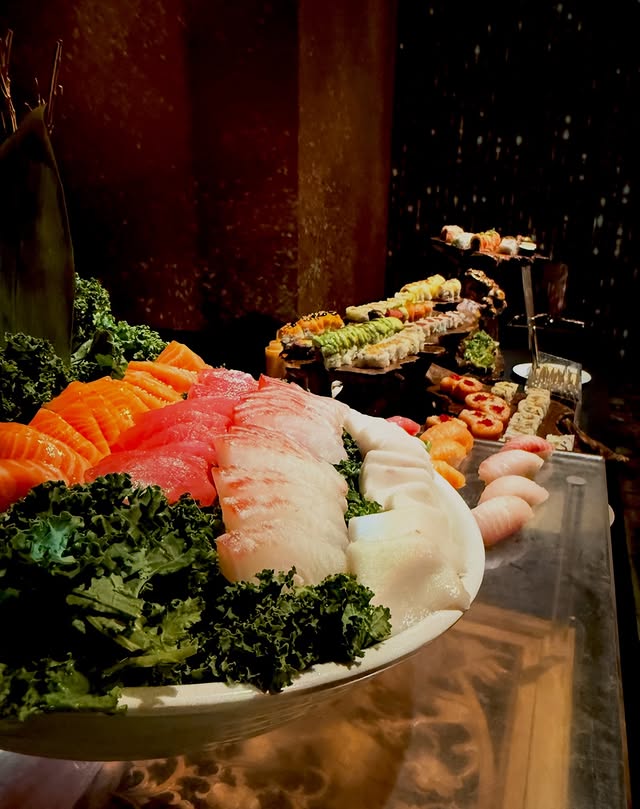 Premium sashimi and sushi platter served at a New York City event with fresh tuna and salmon