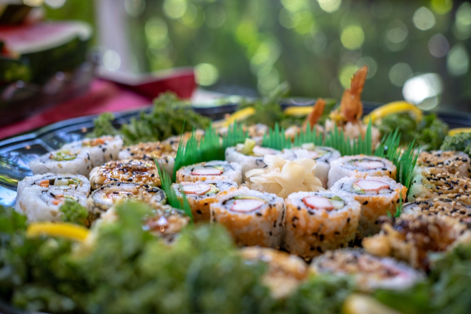 Beautifully arranged sushi party platter with colorful rolls for a New York celebration